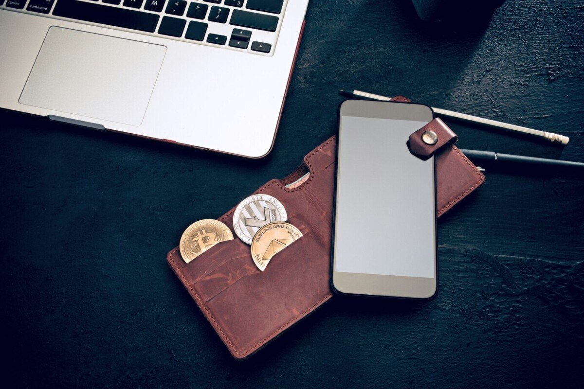 A picture of a wallet and a phone
